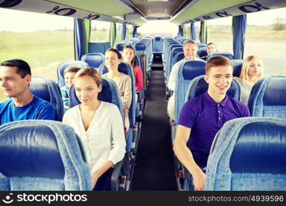 transport, tourism, road trip and people concept - group of happy passengers or tourists in travel bus. group of happy passengers in travel bus