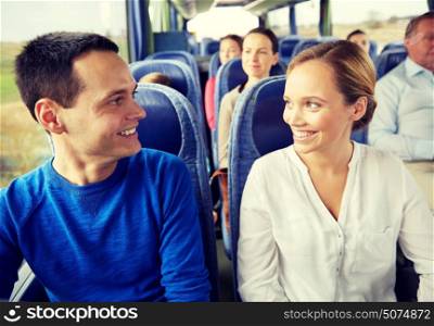 transport, tourism, road trip and people concept - group of happy passengers or tourists in travel bus. group of happy passengers in travel bus