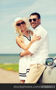 transport, travel, love, date and people concept - happy man and woman hugging near cabriolet car at sea side