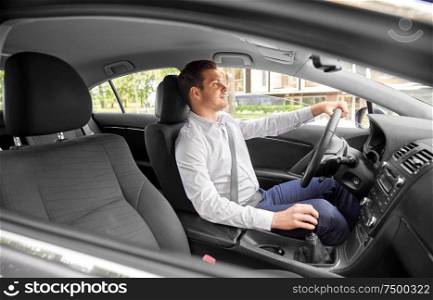 transport, vehicle and people concept - man or driver driving car in summer. man or driver driving car