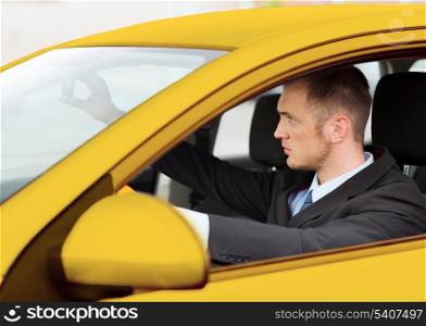 transportation and vehicle concept - businessman or taxi driver driving a car