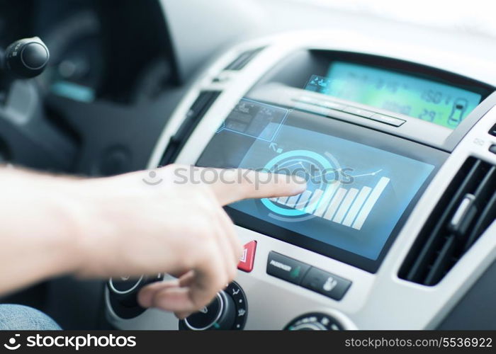 transportation and vehicle concept - man using car control panel