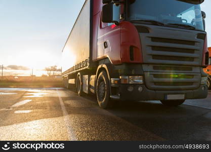 transportation, freight transport and vehicle concept - close up of truck on parking. close up of truck on parking