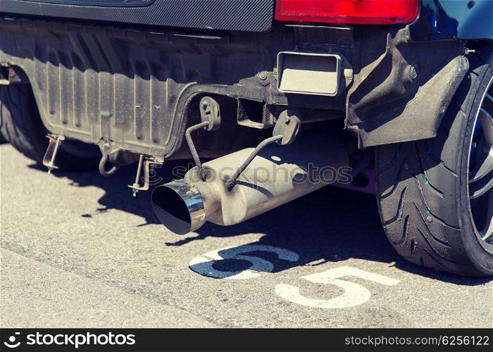 transportation, freight transport and vehicle parts concept - close up of truck exhaust pipe