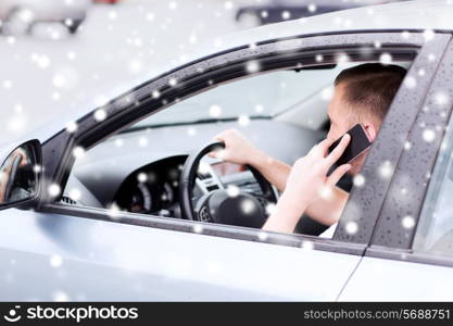 transportation, people, technology and vehicle concept - close up of man using smartphone while driving car