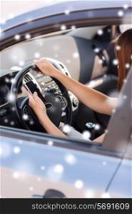 transportation, people, technology and vehicle concept - close up of woman using smartphone while driving car