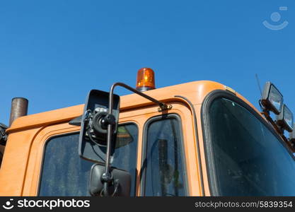 transportation, transport and vehicle parts concept - close up of road service car cabin with flasher