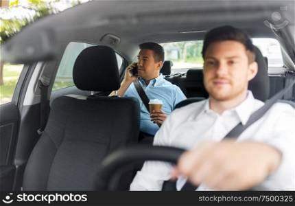 transportation, vehicle and people concept - middle aged male passenger with takeaway coffee cup calling on smartphone on back seat and car driver. male passenger with coffee calling on phone in car