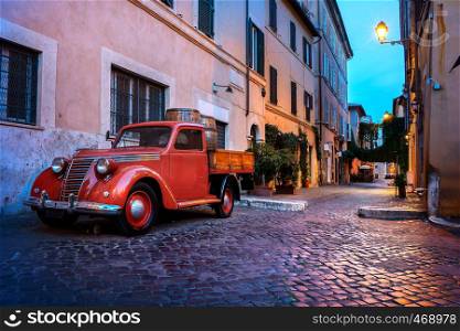 Trastevere street in Rome at sunset Italy