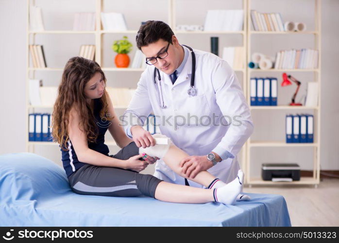 Traumatologist is taking care of the patient