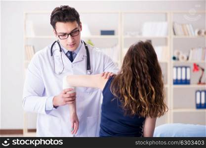 Traumatologist is taking care of the patient