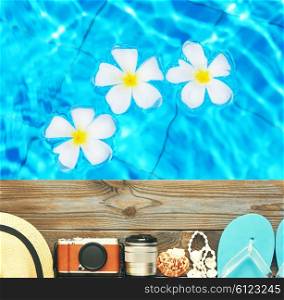 Travel and beach items at pool