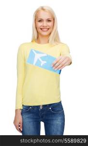 travel and transportation concept - smiling young woman with airplane ticket