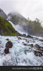 Travel attraction. Powerful twin waterfall Latefoss or Latefossen, Odda Hordaland County in Norway.. Latefossen waterfall in Norway