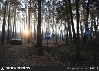 travel by car. car and tent on the background of signs place for camping