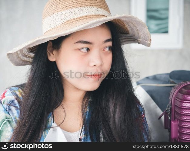 Travel concept from Young Asian woman in summer clothes smiling cheerful and happy.