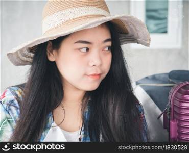 Travel concept from Young Asian woman in summer clothes smiling cheerful and happy.