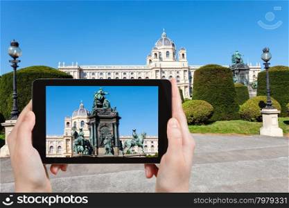 travel concept - tourist snapshot of Empress Maria Theresa monument on Maria Theresien platz in Vienna on tablet pc