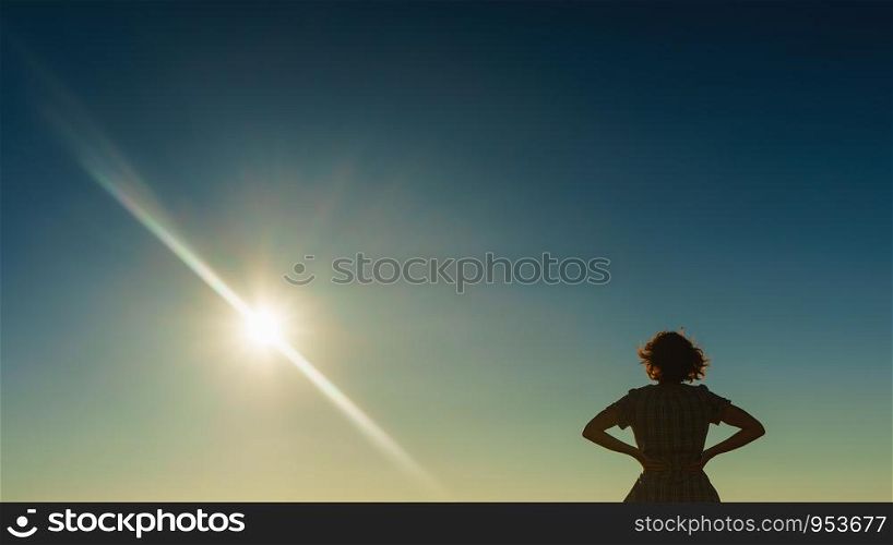 Travel concept. Tourist woman enjoying nature beautiful sunset. Tourist woman on enjoying sunset