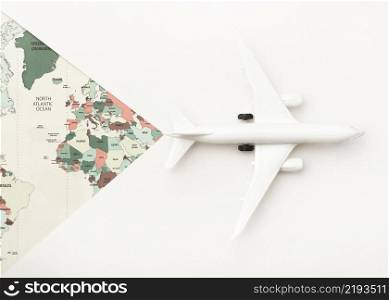 travel concept with world map toy plane