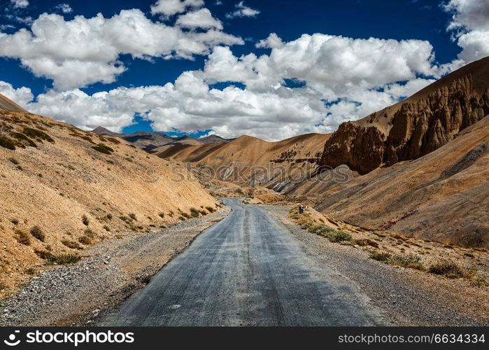 Travel forward adventure background -  Trans-Himalayan Manali-Leh highway road in Himalayas. Ladakh, Jammu and Kashmir, India. Trans-Himalayan Manali-Leh highway road. Ladakh, Jammu and Kashm