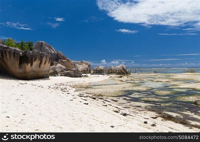 travel, landscape and nature concept - rocks on seychelles island beach in indian ocean. rocks on seychelles island beach in indian ocean. rocks on seychelles island beach in indian ocean