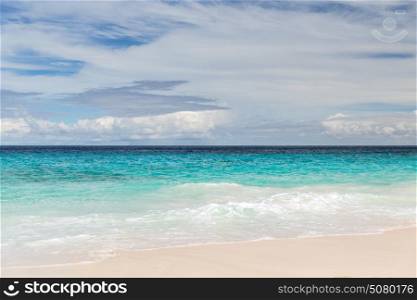 travel, seascape and nature concept - beach in indian ocean on seychelles. beach in indian ocean on seychelles