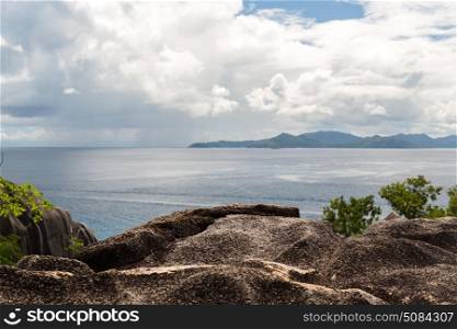 travel, seascape and nature concept - view from island to indian ocean on seychelles. view from island to indian ocean on seychelles. view from island to indian ocean on seychelles
