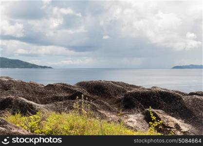 travel, seascape and nature concept - view from island to indian ocean on seychelles. view from island to indian ocean on seychelles. view from island to indian ocean on seychelles