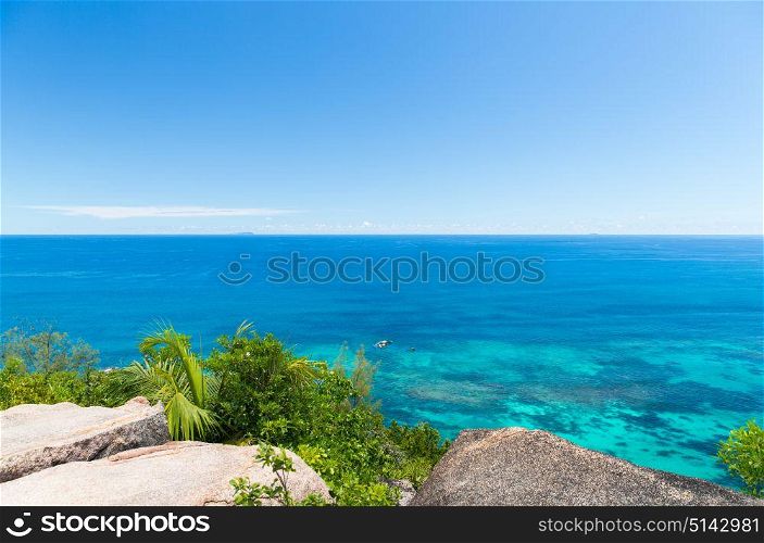 travel, seascape and nature concept - view to indian ocean from seychelles island. view to indian ocean from seychelles island