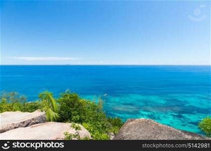 travel, seascape and nature concept - view to indian ocean from seychelles island. view to indian ocean from seychelles island