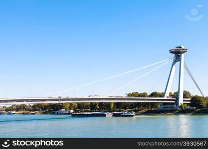 travel to Bratislava city - view of Most SNP (Bridge of the Slovak National Uprising, UFO Bridge, Novy most, New Bridge) road bridge over Danube river in Bratislava