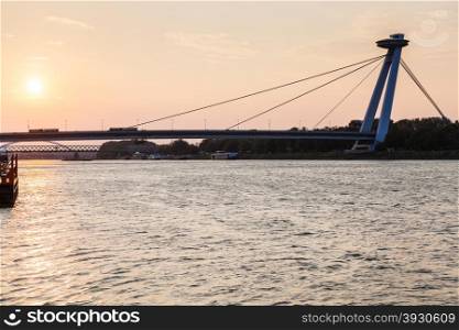 travel to Bratislava city - view of SNP bridge across Danube river in early morning