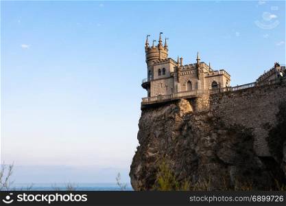 travel to Crimea - Swallow Nest Castle on Aurora Cliff in Gaspra District on Crimean South Coast of Black Sea in evening