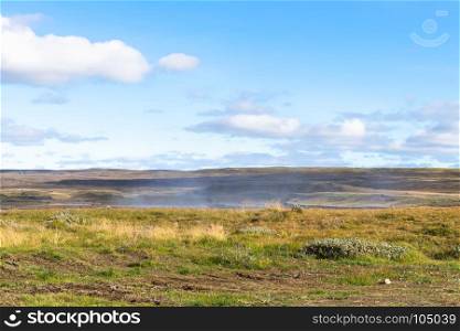 travel to Iceland - blue sky over canyon of Olfusa river with Gullfoss waterfall in autumn