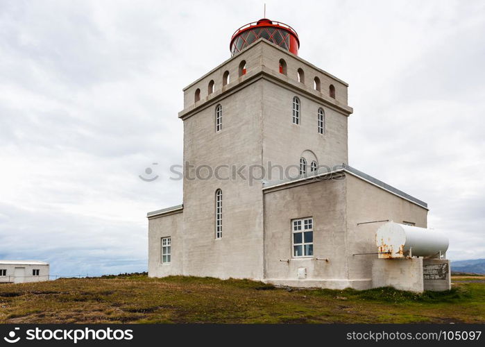 travel to Iceland - exterior of Dyrholaeyjarvit lighthouse on Dyrholaey peninsula, near Vik I Myrdal village on Atlantic South Coast in Katla Geopark in september