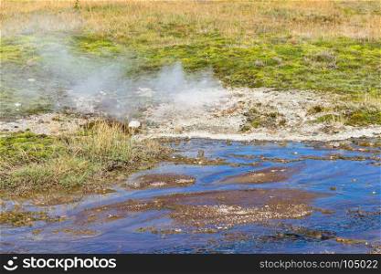 travel to Iceland - hot spring in Haukadalur geyser valley in september