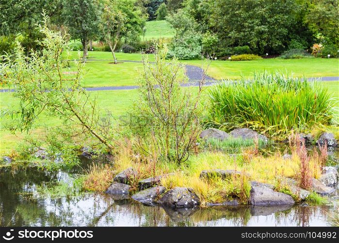 travel to Iceland - landscape of public family park in laugardalur valley of Reykjavik city in september