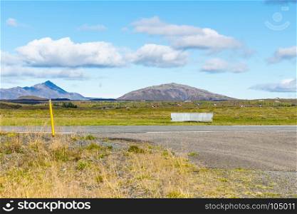 travel to Iceland - landscape with Laugarvatnsvegur road near Efsti-Dalur village in Iceland in autumn