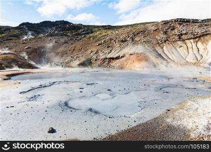 travel to Iceland - mudpot crater in geothermal Krysuvik area on Southern Peninsula (Reykjanesskagi, Reykjanes Peninsula) in september