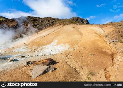 travel to Iceland - solfatara on yellow slope in geothermal Krysuvik area on Southern Peninsula (Reykjanesskagi, Reykjanes Peninsula) in september