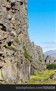travel to Iceland - stone walls of Almannagja Fault in Thingvellir national park in autumn