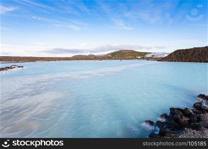 travel to Iceland - view of Blue Lagoon Geothermal lake in Grindavik lava field outside spa resort in autumn evening