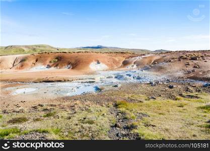 travel to Iceland - view of geothermal Krysuvik area with mud pools on Southern Peninsula (Reykjanesskagi, Reykjanes Peninsula) in september
