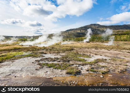 travel to Iceland - view of Haukadalur geyser valley in autumn