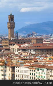 travel to Italy - above view of Florence town with Palazzo Vecchio from Piazzale Michelangelo