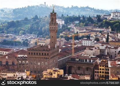 travel to Italy - above view of Palazzo Vecchio in Florence city from Campanile
