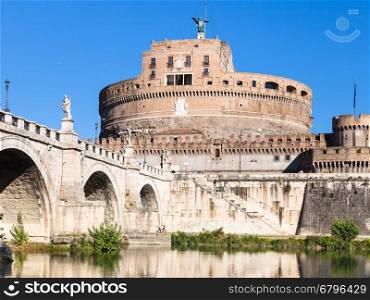 travel to Italy - Castel Sant Angelo (Castle of the Holy Angel, Mausoleum of Hadrian) and bridge of St Angel in Rome city from Tiber river in sunny day