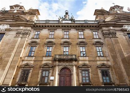 travel to Italy - facade of Complesso di San Firenze (Complex of San Firenze) with two churches San Firenze and San Filippo Neri on Piazza di San Firenze in Florence city after rain