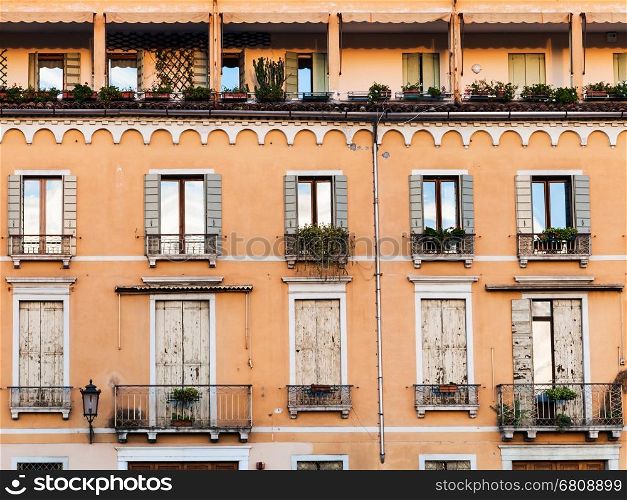 travel to Italy - facade of old apartment house in Padua city in autumn evening